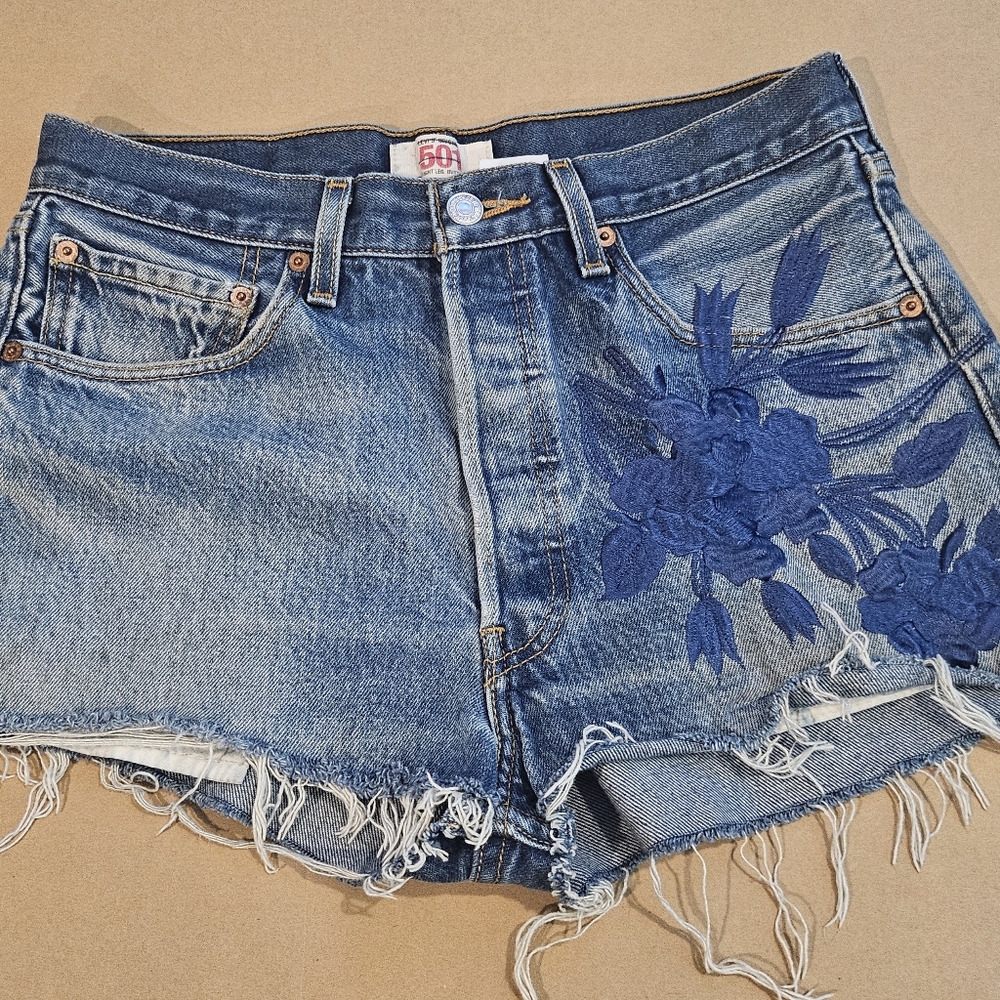 Levi's Distressed Denim Shorts with Blue Floral Applique